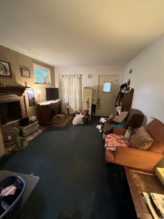 Columbus OH home before foreclosure — interior room in distressed condition
