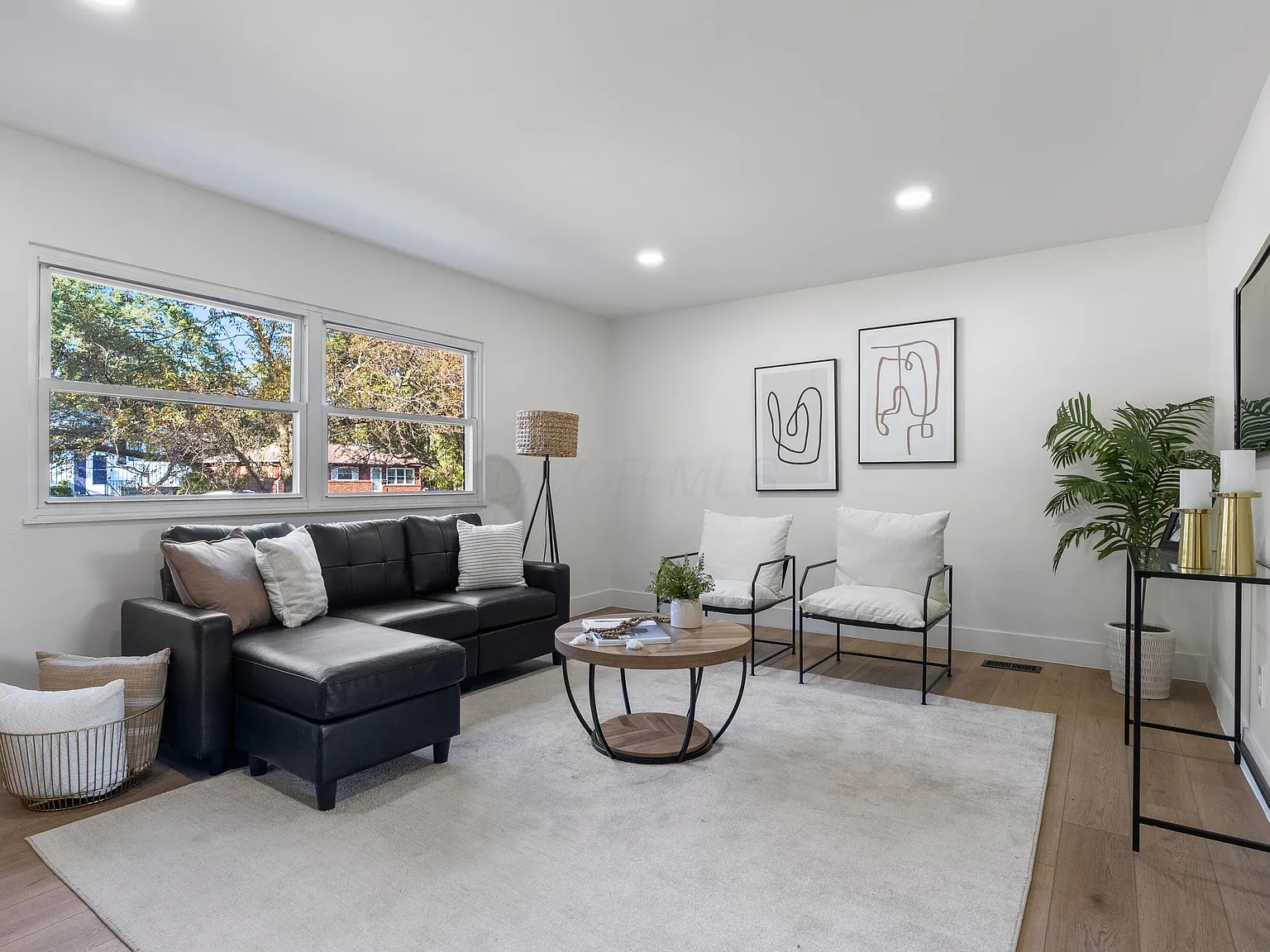 Columbus home after renovation — updated living room with hardwood floors