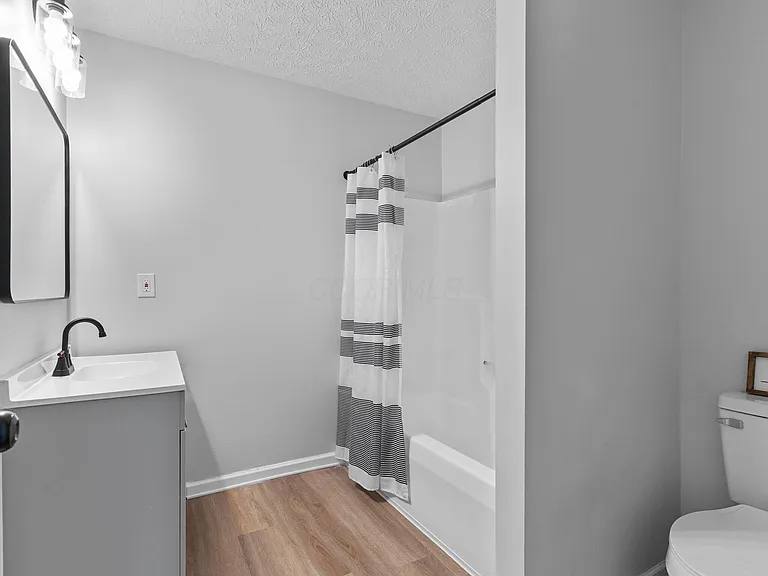 Columbus OH after renovation — renovated room with new flooring