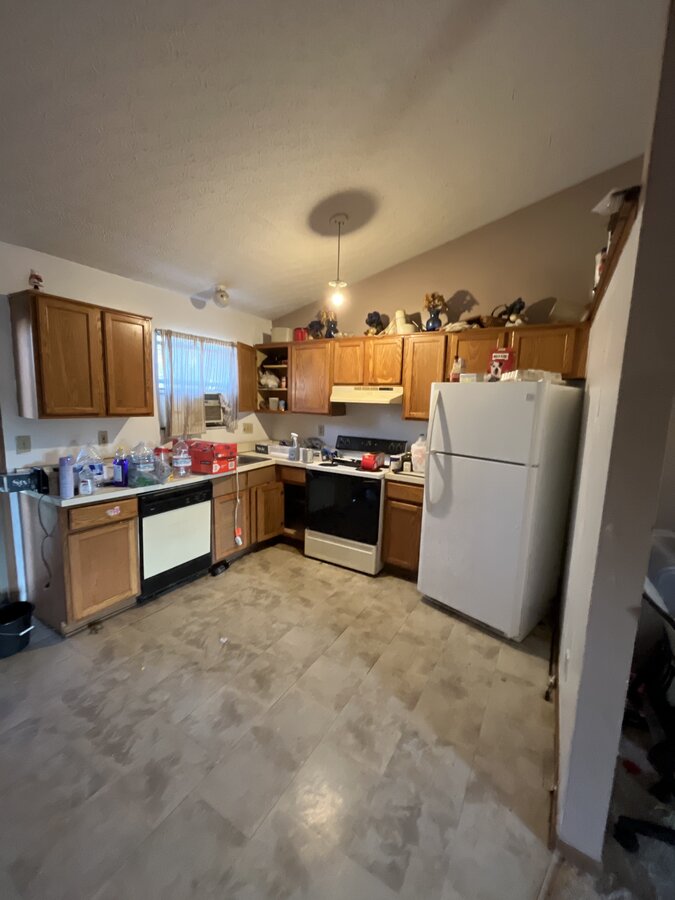 Columbus OH home before — dated kitchen with original cabinets, vacant for 8 years after water damage