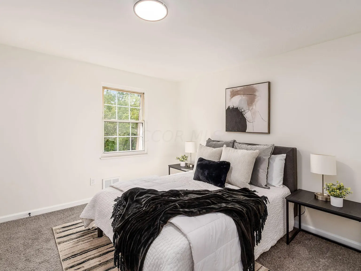 Lancaster OH after renovation — renovated bedroom with new carpet