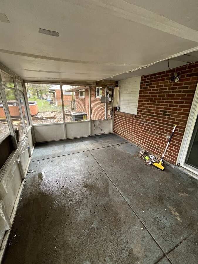 Reynoldsburg OH home before — damaged enclosed porch needing repairs