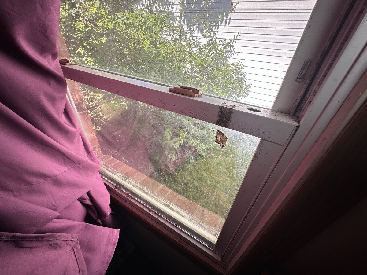 Westerville OH rental home before — cluttered interior with tenant belongings